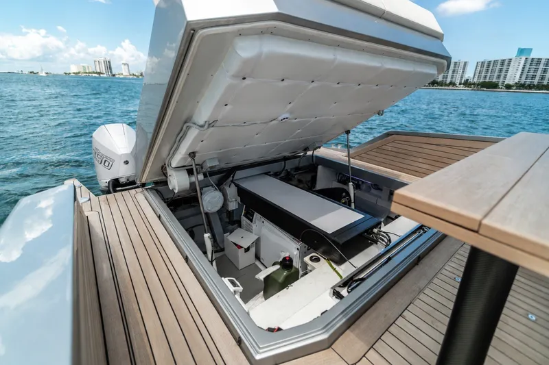 Slide: The Image of Open engine compartment of 2021 Wally wallytender48X yacht on water. - 26