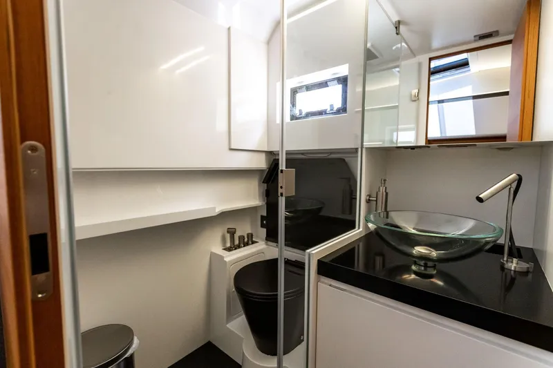 Slide: The Image of Modern bathroom in 2021 Wally 48 WALLYTENDER X yacht with glass sink and sleek design. - 21