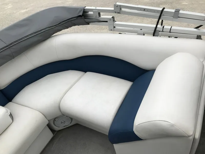 Slide: The Image of 2015 Palm Beach Ultra Sport 220 boat seating with white and blue upholstery. - 10