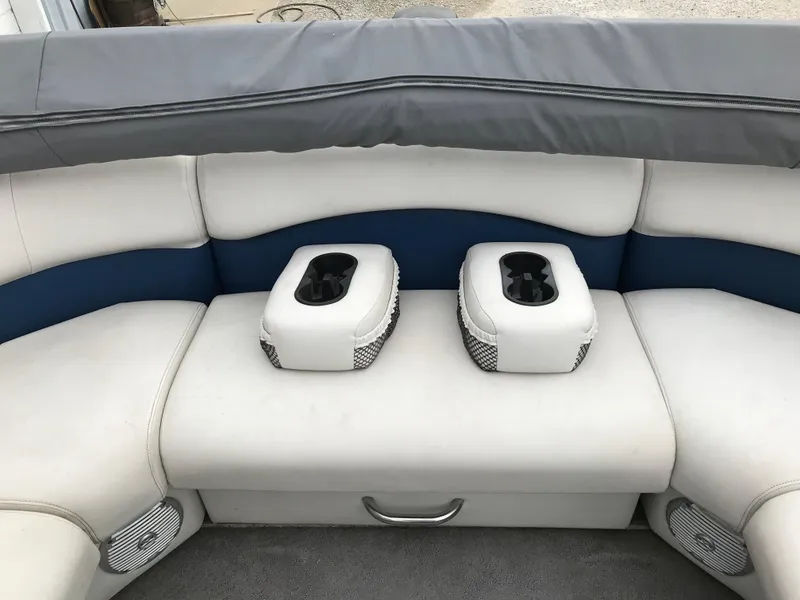 Slide: The Image of Interior seating of 2015 Palm Beach Ultra Sport 220 boat with cup holders. - 11