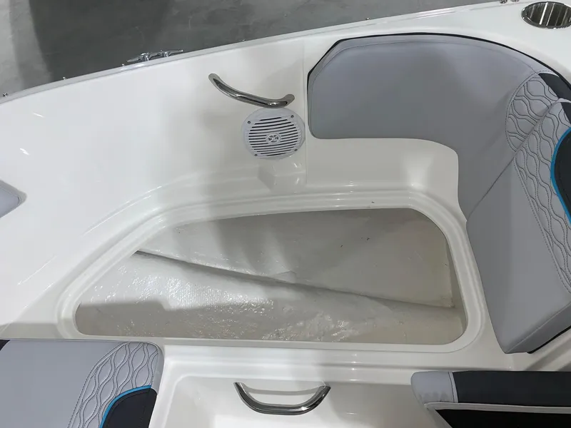 Slide: The Image of 2024 Bayliner Element M17 boat interior with seating and storage compartment. - 11
