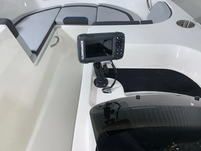 Slide: The Image of 2024 Bayliner Element M17 boat interior with Lowrance fishfinder. - 6