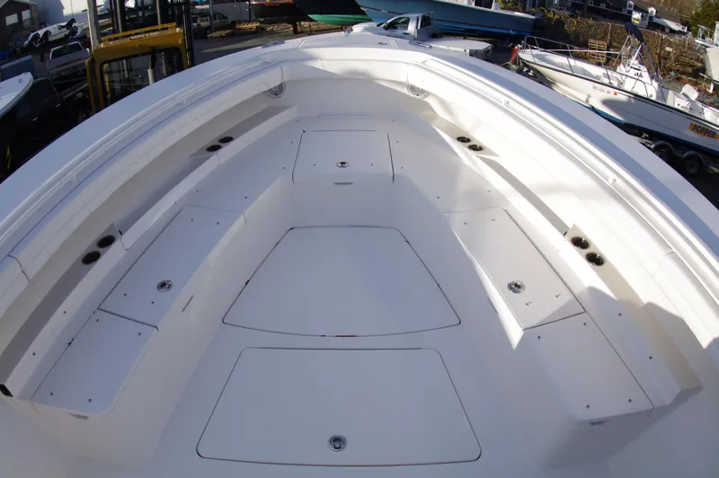 Slide: The Image of 2018 Regulator 41 Center Console boat with spacious deck and storage compartments. - 10