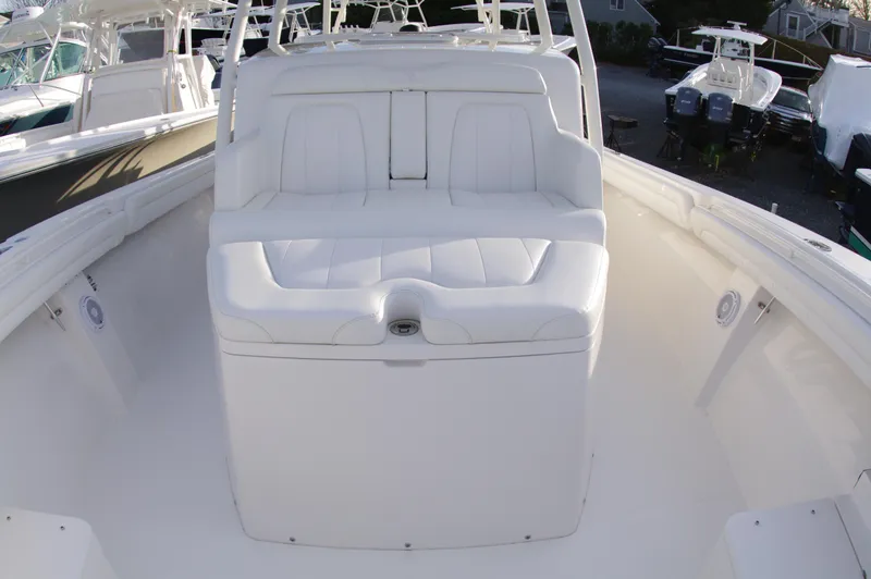 Slide: The Image of 2018 Regulator 41 Center Console boat with white seating area. - 8