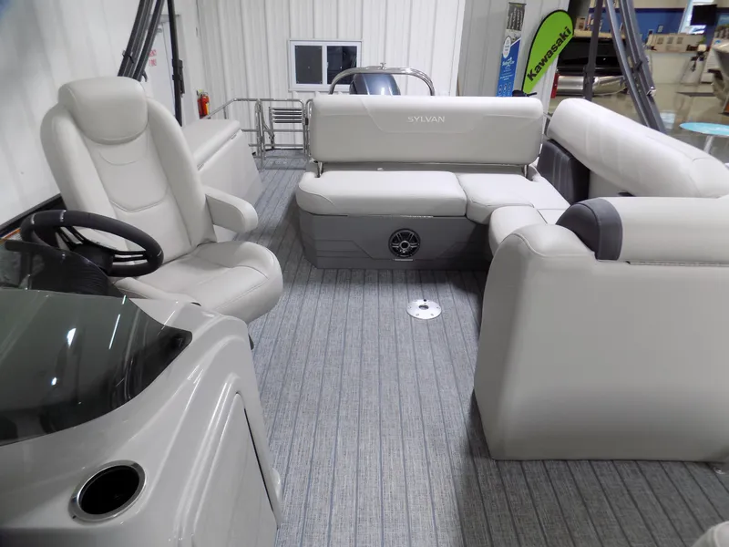 Slide: The Image of 2023 Sylvan Mirage X X3 CLZ pontoon boat interior with plush seating and modern design. - 4