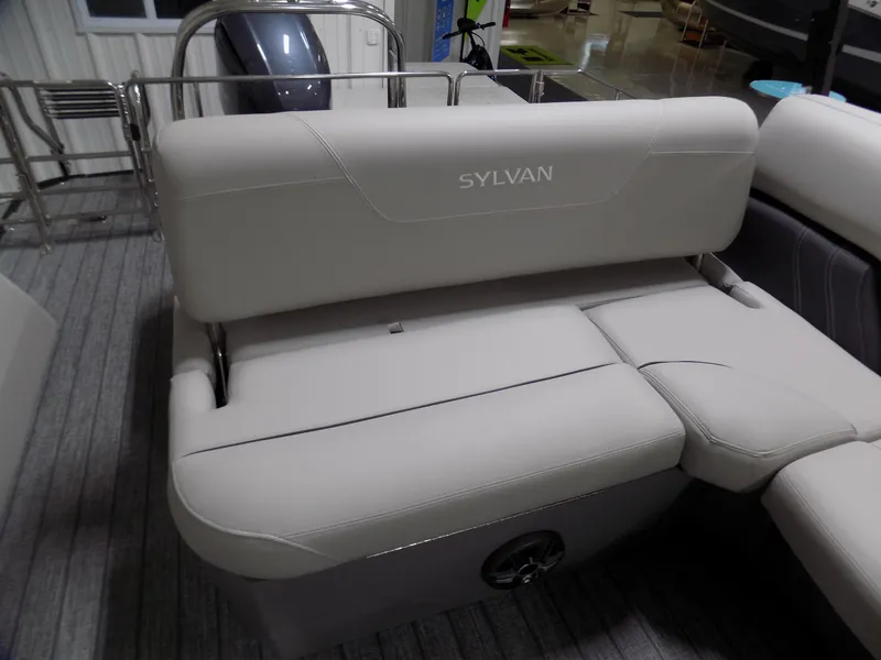 Slide: The Image of 2023 Sylvan Mirage X X3 CLZ boat interior with beige seating and sleek design. - 9
