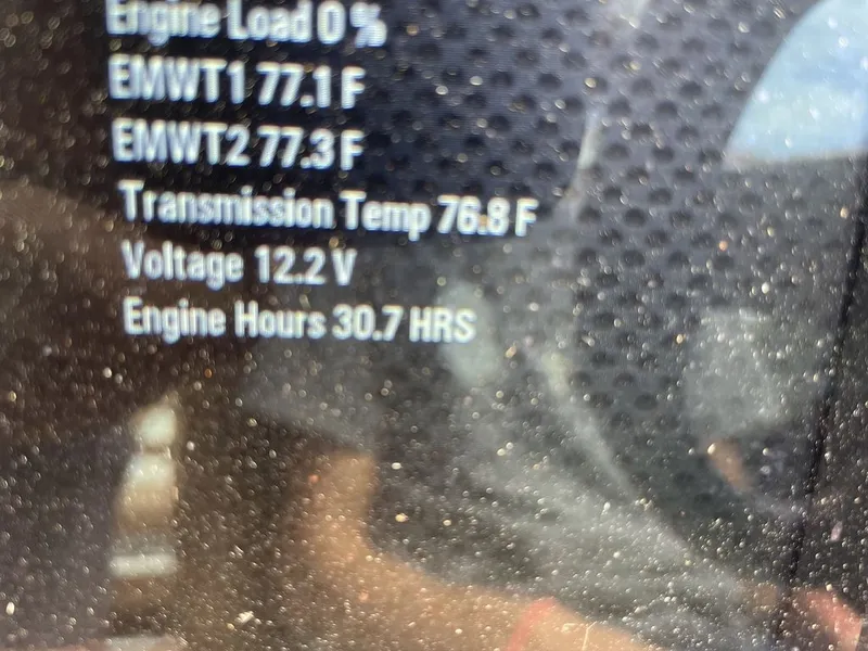 Slide: The Image of Close-up of 2021 Malibu 22 LSV engine display showing various metrics. - 11