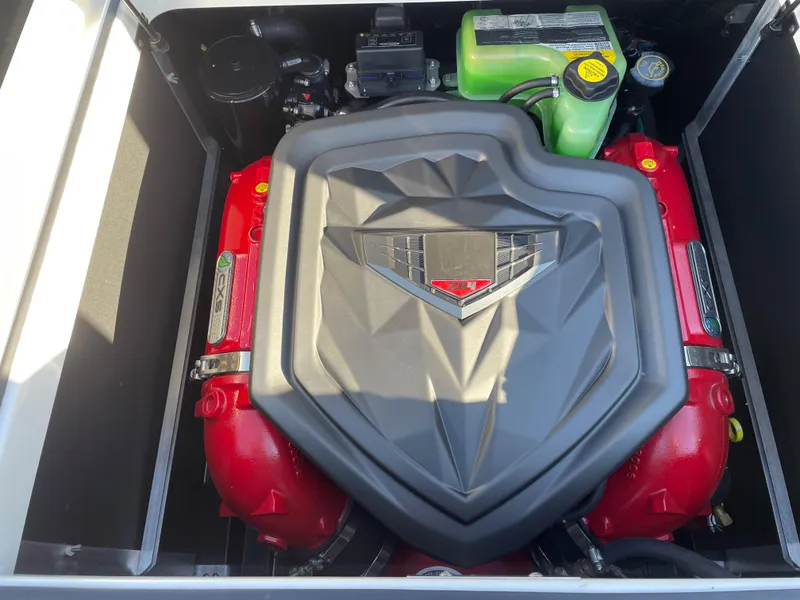 Slide: The Image of Engine of 2021 Nautique Super Air Nautique GS24 boat. - 10