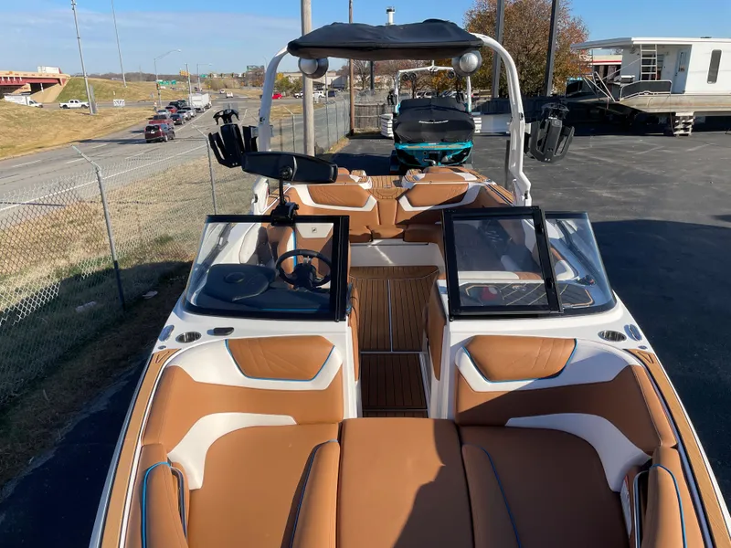 Slide: The Image of 2021 Nautique Super Air Nautique GS24 with brown seating. - 4