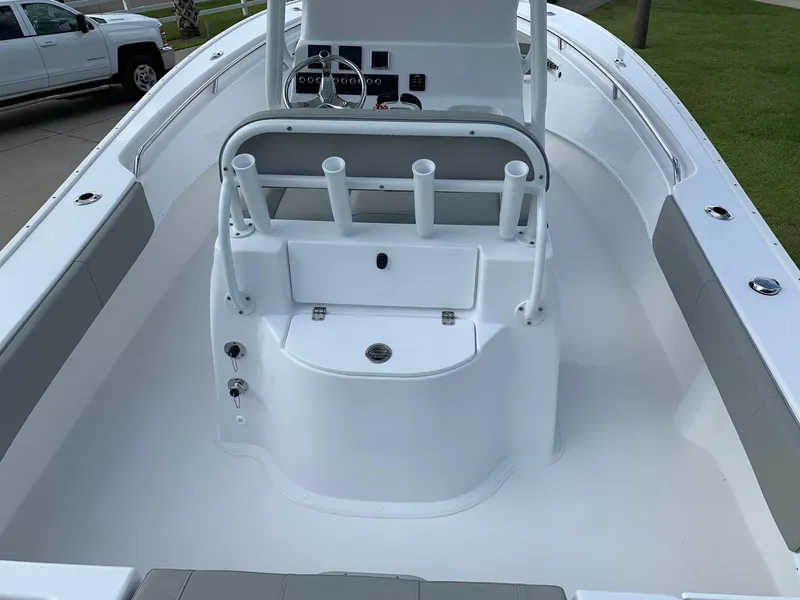 Slide: The Image of 2024 Cape Horn 24 XS boat interior with rod holders and console. - 5