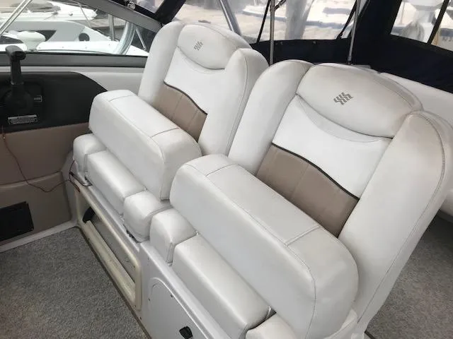 Slide: The Image of 2007 Four Winns 278 Vista boat interior with white leather seating. - 16