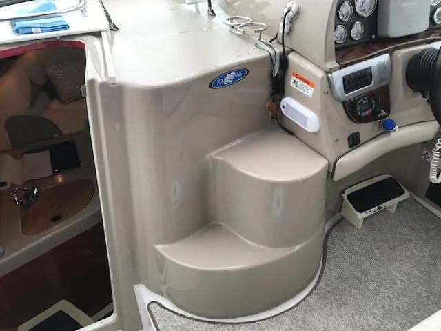 Slide: The Image of 2007 Four Winns 278 Vista boat interior with control panel and steps. - 8