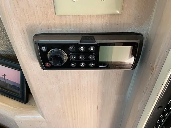 Slide: The Image of Fusion stereo system on a 1991 Hatteras 40 Motor Yacht interior wall. - 20