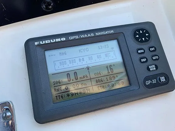 Slide: The Image of Furuno GPS/WAAS Navigator on 1991 Hatteras 40 Motor Yacht dashboard. - 26