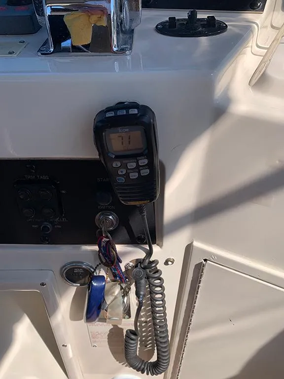 Slide: The Image of VHF radio and control panel on a 1991 Hatteras 40 Motor Yacht. - 33