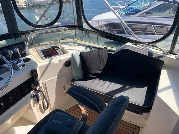 Slide: The Image of Interior helm of 1991 Hatteras 40 Motor Yacht with navigation equipment and seating. - 39