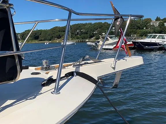 Slide: The Image of 1991 Hatteras 40 Motor Yacht bow on a sunny day in a marina. - 5