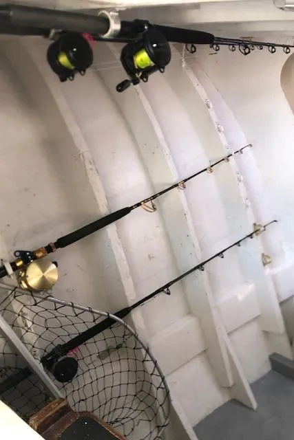 Slide: The Image of Fishing gear on a 1979 Custom Carolina Sportfish 35 boat. - 10