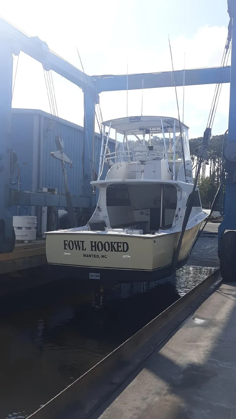 Slide: The Image of 1979 Custom Carolina Sportfish 35 boat in a boatyard. - 17