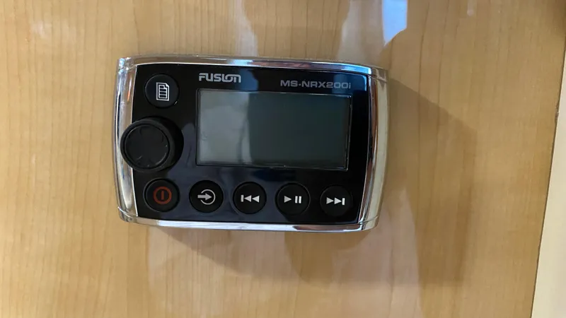 Slide: The Image of Fusion MS-NRX200i marine stereo controller on a 2001 Sea Ray 460 Sundancer. - 26