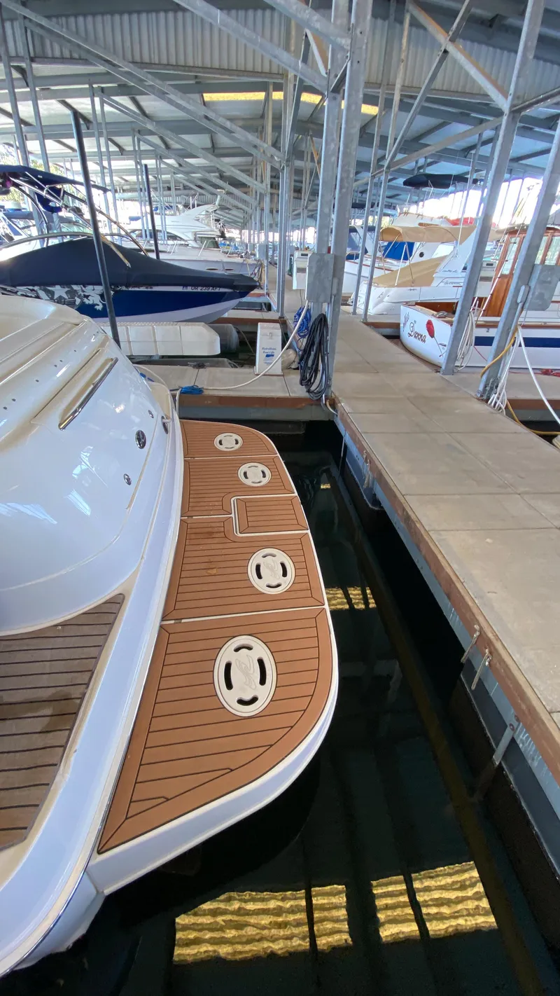 Slide: The Image of 2001 Sea Ray 460 Sundancer docked in a marina. - 4