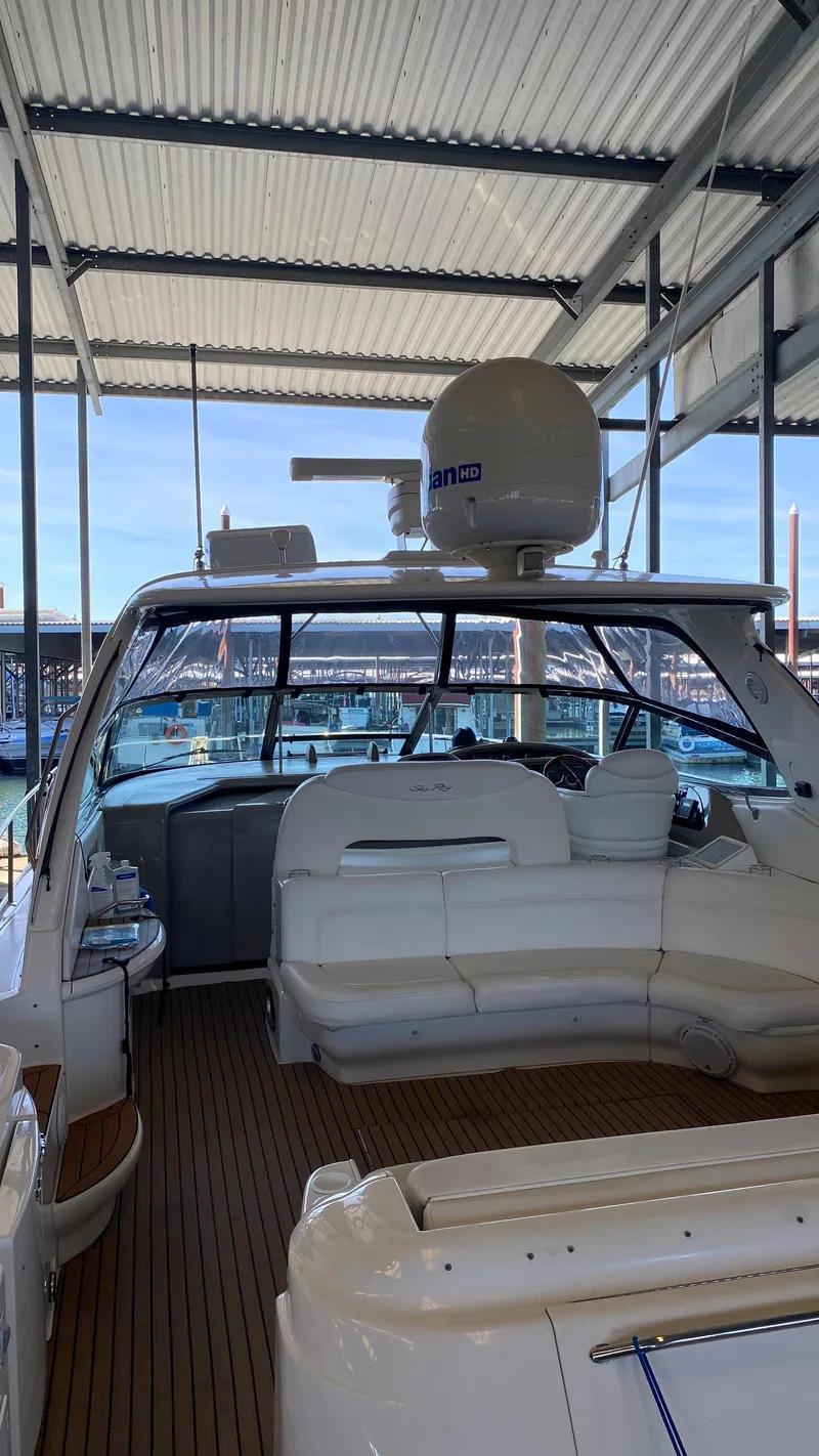 Slide: The Image of 2001 Sea Ray 460 Sundancer yacht with spacious deck and modern amenities. - 6