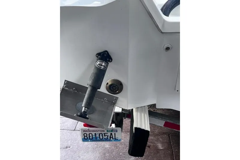 Slide: The Image of 2024 Beneteau Flyer 9 SPACEdeck boat stern with Washington license plate. - 10