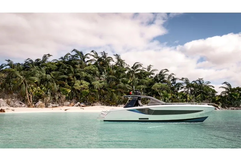 Slide: The Image of Azimut Verve 42 (2023) luxury yacht anchored near tropical island. - 1