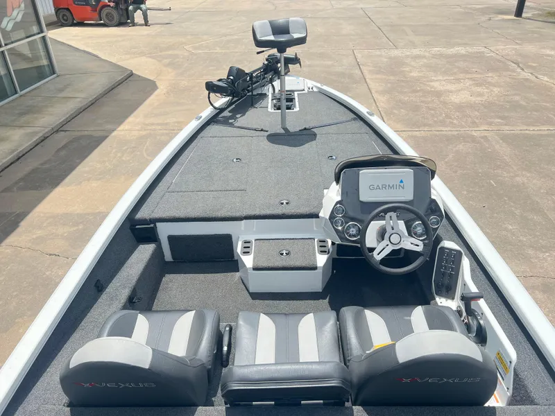 Slide: The Image of 2022 Vexus AVX 1880 boat interior with Garmin navigation system and dual seating. - 4