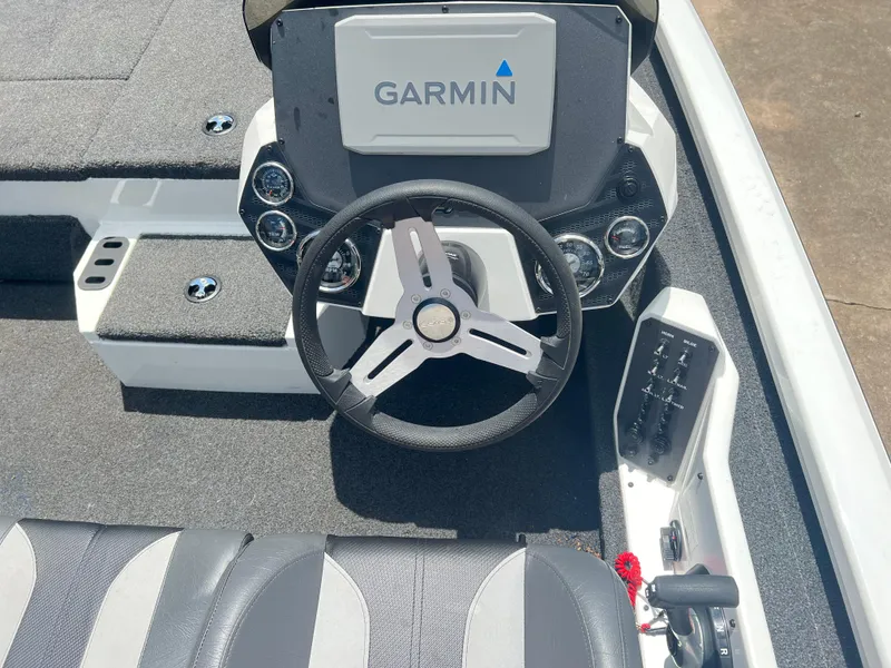 Slide: The Image of 2022 Vexus AVX 1880 boat dashboard with Garmin navigation system and steering wheel. - 5