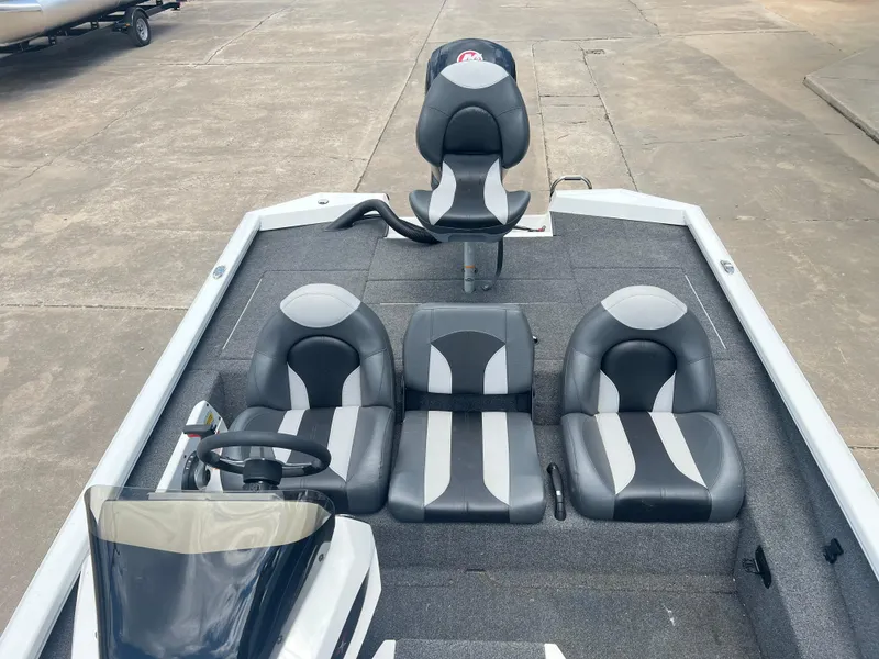 Slide: The Image of 2022 Vexus AVX 1880 boat interior with black and gray seating. - 7