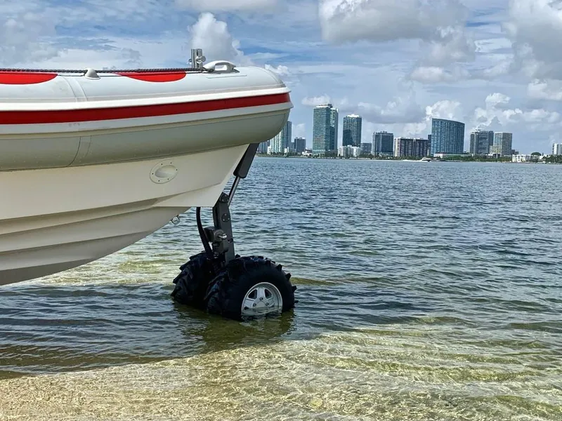 Slide: The Image of 2022 Ocean Craft Marine 7.1 M Amphibious boat on water with city skyline. - 12