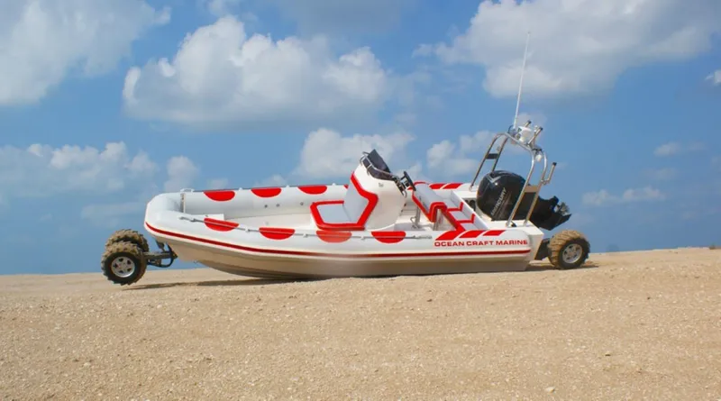 Slide: The Image of 2022 Ocean Craft Marine 7.1 M Amphibious boat on sandy beach under blue sky. - 8