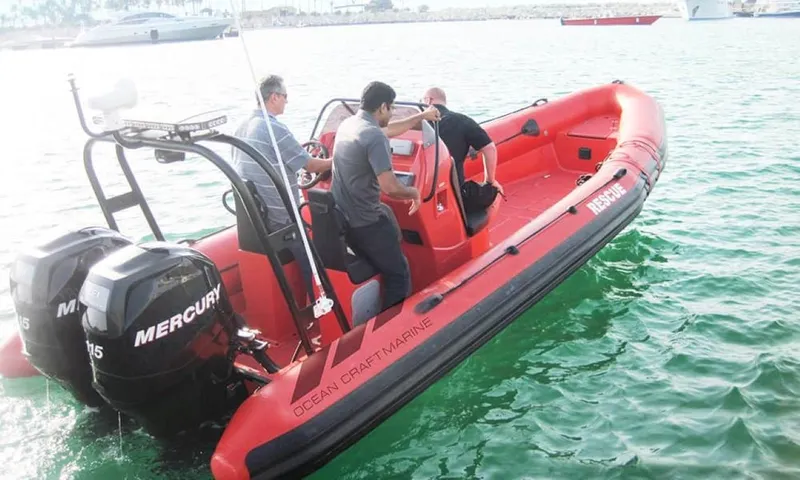 Slide: The Image of 2022 Ocean Craft Marine 9.5M RHIB Professional Search and Rescue boat on water. - 10