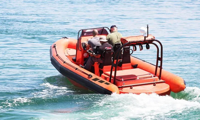 Slide: The Image of 2022 Ocean Craft Marine 9.5M RHIB Professional Search and Rescue boat on water. - 12