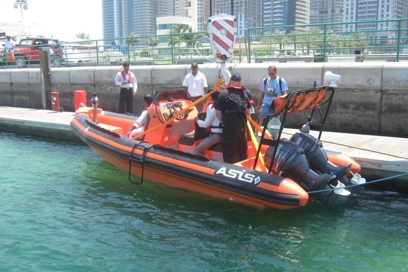 Slide: The Image of 2022 Ocean Craft Marine Solas Rescue 6.5M boat docked with crew onboard. - 9