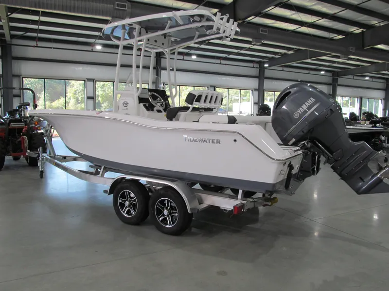 Slide: The Image of 2022 Tidewater 210 LXF boat with Yamaha engine on trailer in showroom. - 3