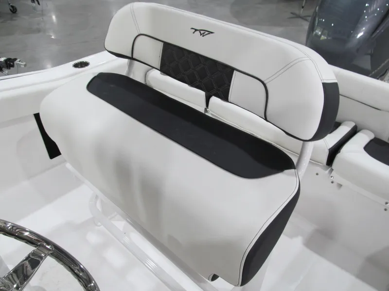 Slide: The Image of 2022 Tidewater 210 LXF boat seat with black and white upholstery. - 5