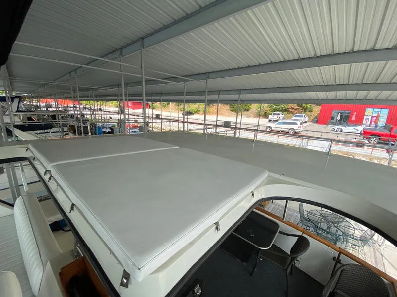 Slide: The Image of 1986 Carver 4207MY yacht under covered dock. - 40