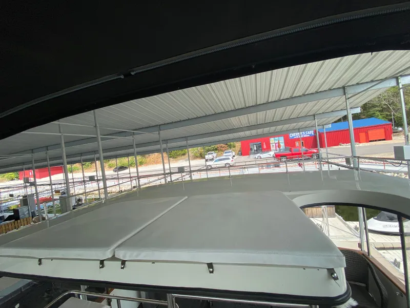 Slide: The Image of 1986 Carver 4207MY yacht under covered dock. - 41