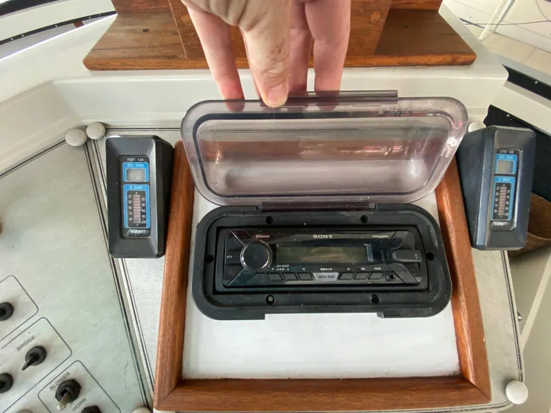 Slide: The Image of 1986 Carver 4207MY boat stereo system with protective cover and speakers. - 47