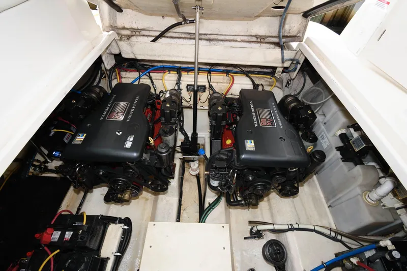 Slide: The Image of 2009 Monterey 340 Sport Yacht engine compartment with twin engines. - 18