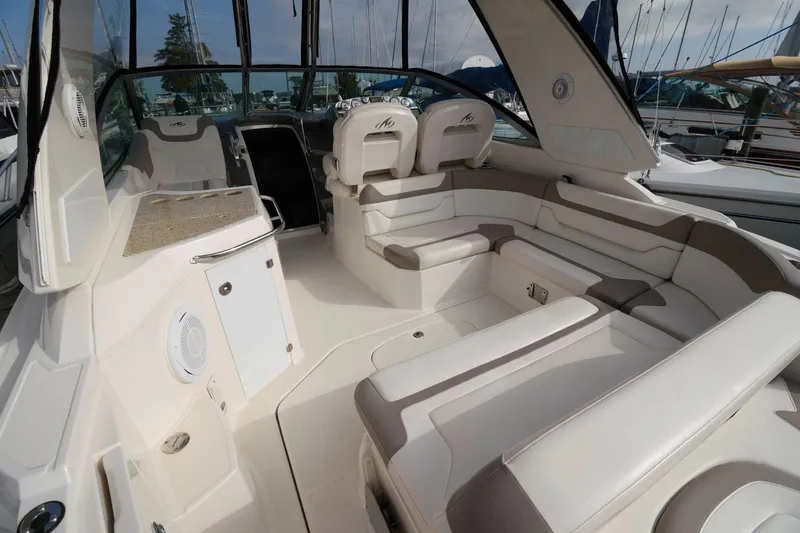 Slide: The Image of 2009 Monterey 340 Sport Yacht interior with spacious seating and modern amenities. - 2