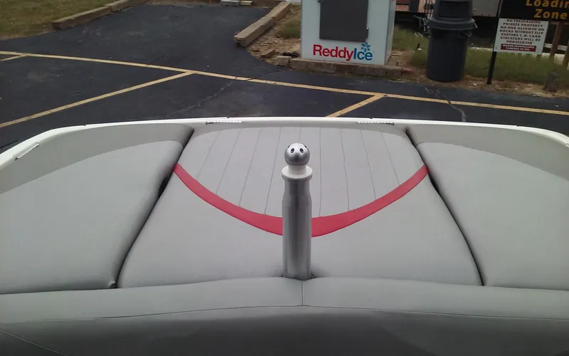 Slide: The Image of 2006 MasterCraft X-Star SS boat with gray and red upholstery. - 12