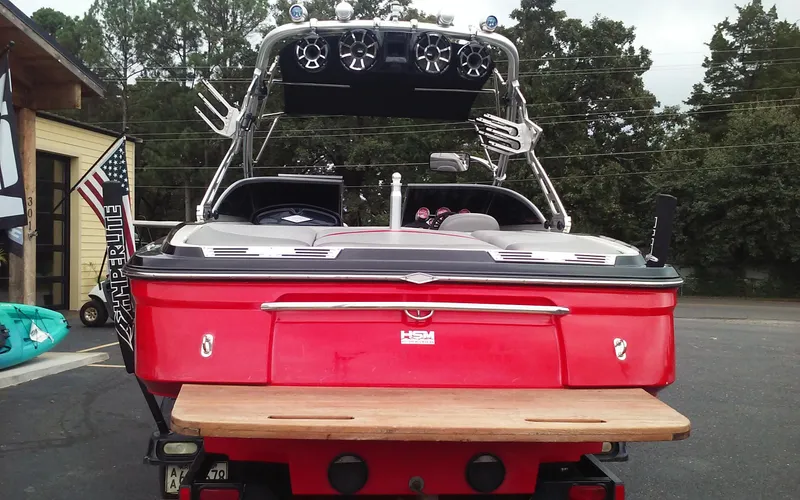 Slide: The Image of 2006 MasterCraft X-Star SS boat, rear view with wakeboard tower and speakers. - 3
