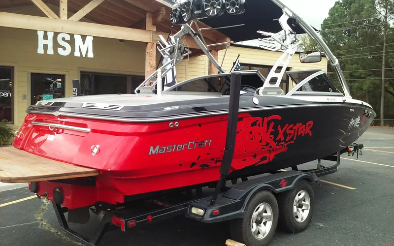 Slide: The Image of 2006 MasterCraft X-Star SS boat on trailer outside HSM building. - 4