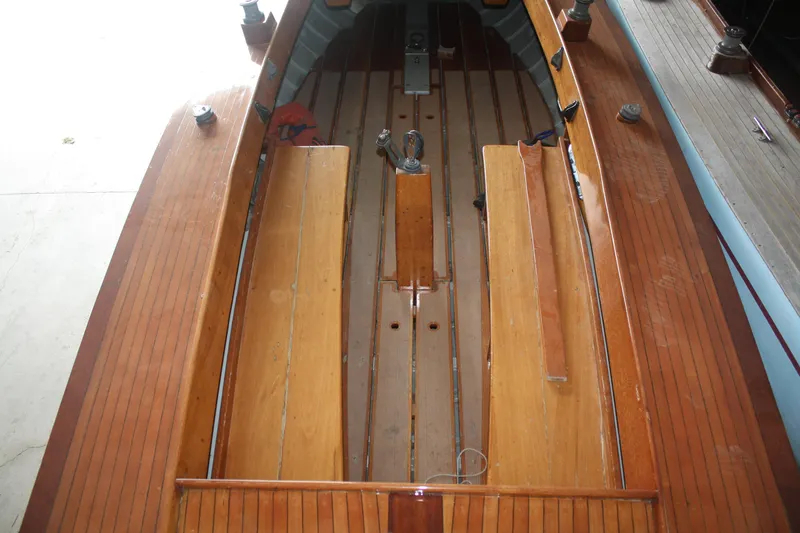 Slide: The Image of 1934 Custom Northern Michigan NM wooden boat interior with bench seats. - 15
