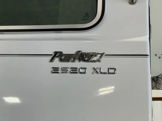 Slide: The Image of 2024 Parker 2520 XLD Sport Cabin boat model nameplate. - 3