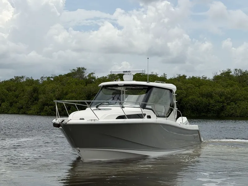 Slide: The Image of Boston Whaler 325 Conquest 2027 - 31