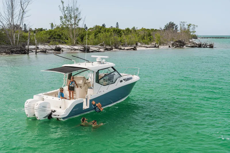 Slide: The Image of Boston Whaler 325 Conquest 2027 - 29